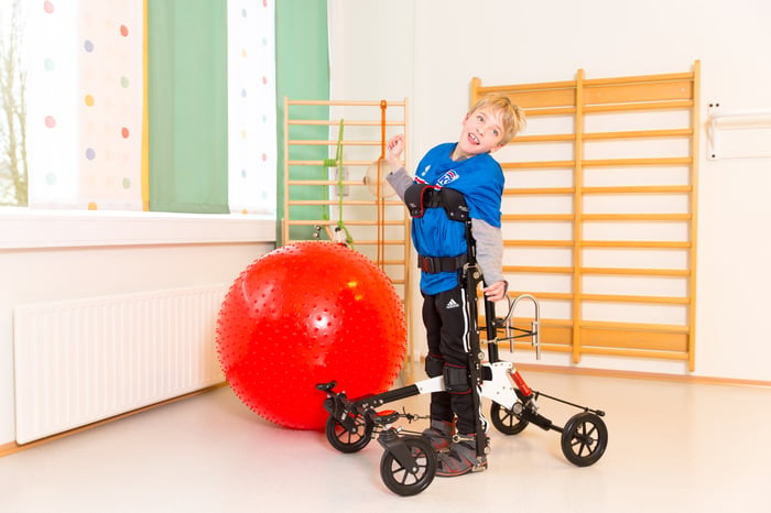 Young boy is standing in his NF-Walker